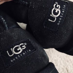 UGGs tall black boot sheepskin and leather